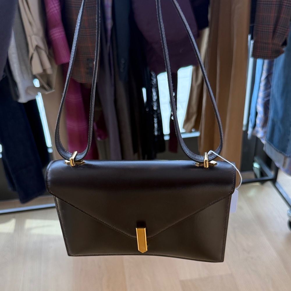 Hermes Black Crossbody Bag with Gold Accents